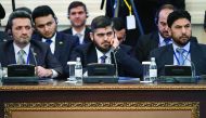 Chief Opposition Negotiator Mohammad Alloush (centre) of the Jaish Al Islam (Army of Islam) rebel group attends the first session of Syria peace talks at Astana's Rixos President Hotel, yesterday.
