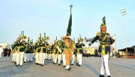 Pakistani Military Band performing at Katara yesterday. RIGHT: Shahzad Ahmad, Pakistan Ambassador to Qatar, Ibrahim Fakroo, Director of Protocol at the Ministry of Foreign Affairs and Ahmad Al Sayed, Deputy General Manager at Katara with other diplomats a