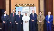 Sheikh Faisal bin Qassim Al Thani (centre), Chairman of Aamal Company with other guests at the event. 