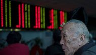 Asia markets inched higher following gains on Wall Street while the dollar continues to face pressure (AFP Photo/JOHANNES EISELE).