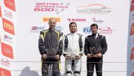 Abdulla Al Khelaifi, Mansour Al Hajri and Mahmoud Al Khalaf, the podium winners at round two of the Qatar Touring Car Championship pose for a group picture at the Losail International Circuit. Al Khelaifi produced a dazzling performance, winning both race