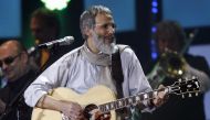 Singer Yusuf Islam, formerly known as Cat Stevens, performs during the Live Earth concert at the soccer arena in Hamburg, northern Germany, July 7, 2007. REUTERS/Christian Charisius