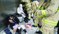 Injured people undergoing medical treatment inside a subway station in Hong Kong, yesterday.