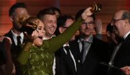 Adele celebrates her Grammys' awards including Best record and Best album of the year performs onstage during the 59th Annual Grammy music Awards on February 12, 2017, in Los Angeles, California. / AFP / VALERIE MACON.