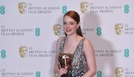 US actress Emma Stone poses with the award for a Leading Actress for her work on the film 'La La Land' at the BAFTA British Academy Film Awards at the Royal Albert Hall in London on February 12, 2017. AFP / Ben STANSALL
