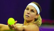 Dominika Cibulkova of Slovakia prepares to serve against Australia’s Samantha Stosur during their Qatar Total Open Quarter-final played at the Khalifa International Tennis Complex in Doha yesterday. Cibulkova won 7-5. 6-4.