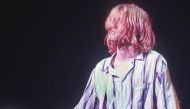 (FILES) This photo taken 19 February 1992 shows Kurt Cobain, lead singer for the US grunge rockers Nirvana, performing at the Nakano Sun Plaza in Tokyo during their 1992 Asian-Pacific tour. AFP / Richard A. Brooks
