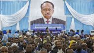 Delegates listen to Somalia's new President Mohamed Abdullahi Mohamed during his inauguration at Mogadishu airport on February 22, 2017. AFP / STRINGER
