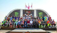 Riders taking part in the opening round of the 2017 MXGP World Championship pose for a group picture at the Losail International Circuit yesterday.