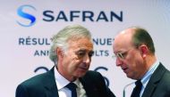 Safran Chief Executive Philippe Petitcolin (L) speaks with Bernard Delpit, Chief Financial Officer, before the company's 2016 annual results presentation in Paris, France, February 24, 2017. REUTERS/Charles Platiau