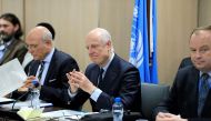 UN Special Envoy for Syria Staffan de Mistura (C) attends a meeting of Intra-Syria peace talks with Syrian government delegation at the Palais des Nations in Geneva on February 25, 2017.   AFP / POOL / Pierre ALBOUY
