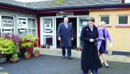 Democratic Unionist Party leader, and former Norther Ireland First Minister, Arlene Foster (second right), leaves after casting her vote in the Northern Ireland Assembly eletcions, at Brookeborough Primary School in Brookeborough, yesterday.