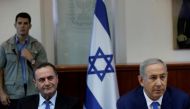 Israel's Prime Minister Benjamin Netanyahu (R) and Transportation Minister Yisrael Katz attend the weekly cabinet meeting in Jerusalem September 4, 2016. REUTERS/Ronen Zvulun
