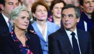 A file photo of French right-wing candidate for the upcoming presidential election Francois Fillon and his wife Penelope during a campaign rally in Paris.