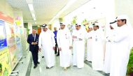 Officials at the educational exhibition for primary school students on food safety and nutrition.
