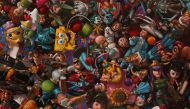 Siamak Azmi using images of dolls to convey a message