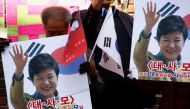 Supporters of South Korea's ousted leader Park Geun-hye gather outside her private home in Seoul, South Korea, March 15, 2017. REUTERS/Kim Kyung-Hoon
