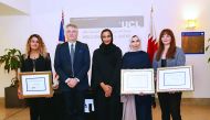 H E Sheikha Hind bint Hamad Al Thani and UCL Qatar Director Dr Sam Evans with recipients of the UCL Qatar Academic Excellence Scholarship.