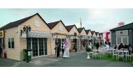 Visitors near the outlets at the Magical Festival Village at Katara.