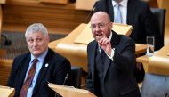 Scottish Green Party co-convener Patrick Harvie (R) speaks in the chamber on the first day of the 'Scotland's Choice' debate on a motion to seek the authority to hold an indpendence referendum at the Scottish Parliament in Edinburgh on March 21, 2017.  AF
