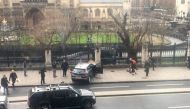 A video grab obtained from the Twitter account of James West, shows a car stopped on the sidewalk in front of the Palace of Westminster which houses the Houses of Parliament in central London on March 22, 2017 during an incident. AFP / Handout 