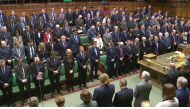 Members of Parliament stand for a minute's silence yesterday to pay tributes to those killed in an attack at Westminster, in London. 