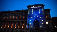 The word Multilingualism (in French) is displayed during a light show projected onto the French Foreign Ministry building to celebrate the 60th anniversary of the Treaty of Rome international agreement that established the creation of the European Economi