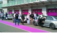 Mercedes-Benz customers and experts prepare to test drive the latest models of cars at Lusail Circuit.
