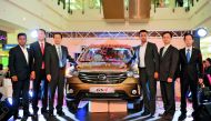Yang Song (third left), Economic and Commercial Counsellor, Embassy of China; Guanfeng Hu (second right), Vice Director of International business division - GAC Motor; and Faisal Sharif (third right), Mananging Director, Domasco, with other officials and 