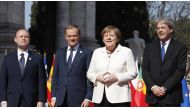ROME, ITALY - MARCH 25 : German Chancellor Angela Merkel (2R) poses with Malta's Prime Minister and EU's rounding President Joseph Muscat (L), EU Council's President Donald Tusk (2L) and Italian Premier Paolo Gentiloni (R) as he arrives for a ceremony mar