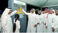 H E Mohammed Saleh Abdulla Al Sada (third left), Minister of Energy and Industry, with Engineer Essa bin Hilal Al Kuwari (left), President of Qatar General Electricity and Water Corporation (Kahramaa) turn off electricity during the Earth Hour at the Kahr