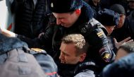 Police officers detain anti-corruption campaigner and opposition figure Alexei Navalny during a rally in Moscow, Russia, March 26, 2017. REUTERS/Maxim Shemetov
