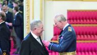 Ian Gray, CEO of Vodafone Qatar, being granted an Officer of the Most Excellent Order of the British Empire (OBE) by HRH Prince Charles at Buckingham Palace.