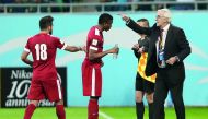 Qatar coach Jorge Fossati reacts during the game.