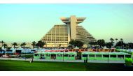 Food stalls getting ready for the eighth Qatar International Food Festival which opens today. Pic: Abdul Basit/ The Peninsula