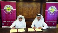 Officials signing the MoU.