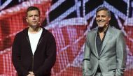 Actors Matt Damon (L) and George Clooney speak onstage at CinemaCon 2017 Paramount Pictures Presentation Highlighting Its Summer of 2017 and Beyond at The Colosseum at Caesars Palace during CinemaCon on March 28, 2017 in Las Vegas, Nevada. AFP / ANGELA WE