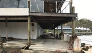 Damaged buildings can be seen after Cyclone Debbie hit the resort on Hamilton Island, located off the east coast of Queensland in Australia March 29, 2017. Jon Clements/Handout via REUTERS