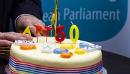 A member of Britain's UK Independence Party (UKIP) posed with cakes celebrating the official triggering of Article 50 of the Lisbon Treaty, the Brexit outside the European Union Council headquarters in Brussels, Belgium March 29, 2017. REUTERS/Stringer
