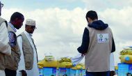 A RAF team inspecting food baskets at a distribution centre in Kenya.
