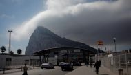 People enter the British territory of Gibraltar, historically claimed by Spain, at its border with Spain, in La Linea de la Concepcion, Spain March 29, 2017. REUTERS/Jon Nazca
