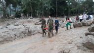 Colombian soldiers evacuate the victims of a deadly avalanche that happened following heavy rains in Macoa, Putumayo Colombia on April 01, 2017.  (Colombian Armed Forces 6th Army / Handout - Anadolu Agency).
