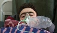 A Syrian man receives treatment at a small hospital in the town of Maaret al-Noman following a suspected toxic gas attack in Khan Sheikhun, a nearby rebel-held town in Syria's northwestern Idlib province, on April 4, 2017.  AFP / Mohamed al-Bakour 
