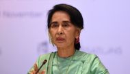 Myanmar State Counsellor Aung San Suu Kyi speaking at the International Enterprise Global Conversation on November 30, 2016  in Singapore. AFP / Roslan Rahman