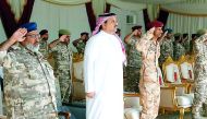 Minister of State for Defence Affairs, H E Dr Khalid bin Mohamed Al Attiyah (centre), at the graduation ceremony of the Joint Special Forces