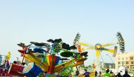 Children enjoy rides at the amusement park at the Al Ahmed Square in Souq Waqif which is the main highlight of the festival. Pic: Raynald C Rivera / The Peninsula