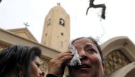 A relative of one of the victims reacts after a church explosion killed at least 21 in Tanta, Egypt, April 9, 2017. REUTERS/Mohamed Abd El Ghany

