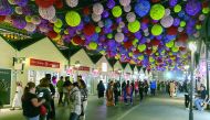 People throng the Magical Festival Village located at the cultural district of Katara. 