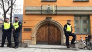 Policemen guard Stockholm district court before the detention of Rakhmat Akilov, the suspect in Friday’s deadly attack. Photograph: Reuters.