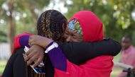 Members of the #BringBackOurGirls campaign embrace each other at a sit-out in Abuja, Nigeria, May 18, 2016 (REUTERS / Afolabi Sotunde) 